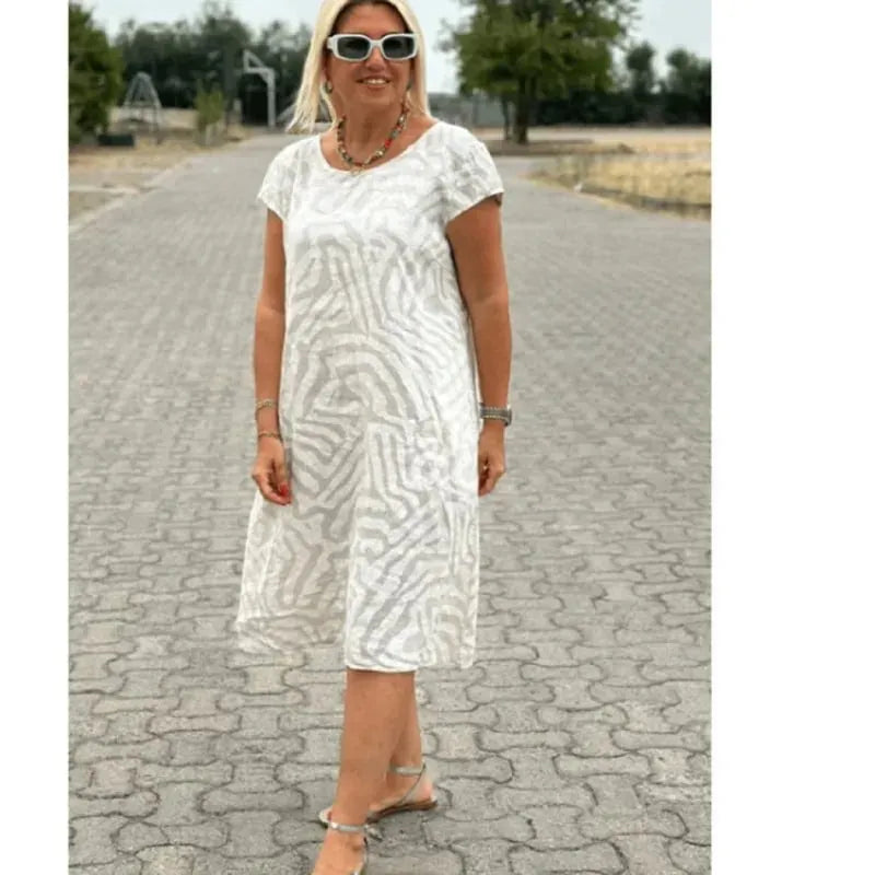 Zebra Flow Dress: Unleash Wild Boho Elegance with Effortless Style