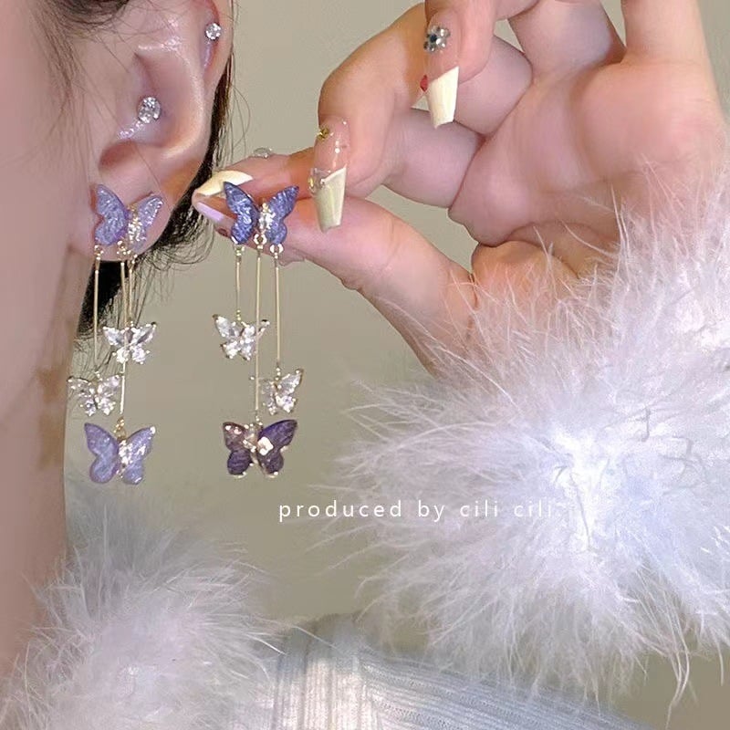 Elevate Elegance: Embrace the Butterfly Cascade Sterling Silver Earrings