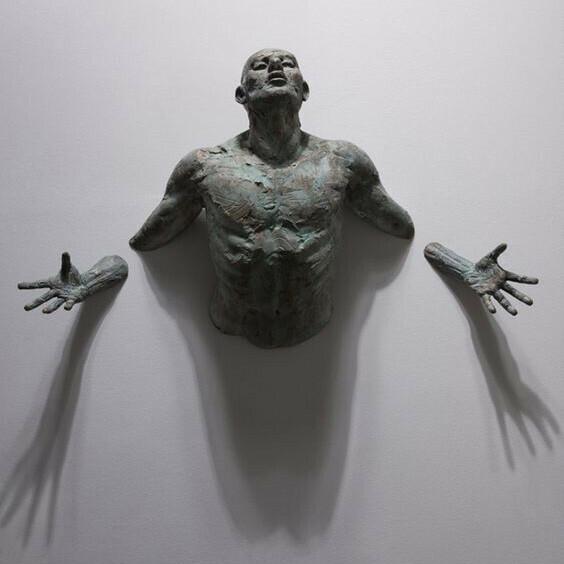 Antique sculpture on wall art bronze statue