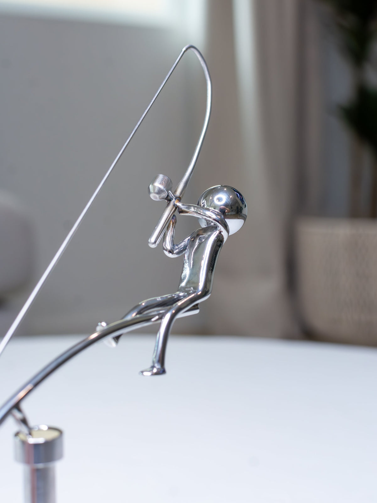 Fisherman Balancing Sculpture