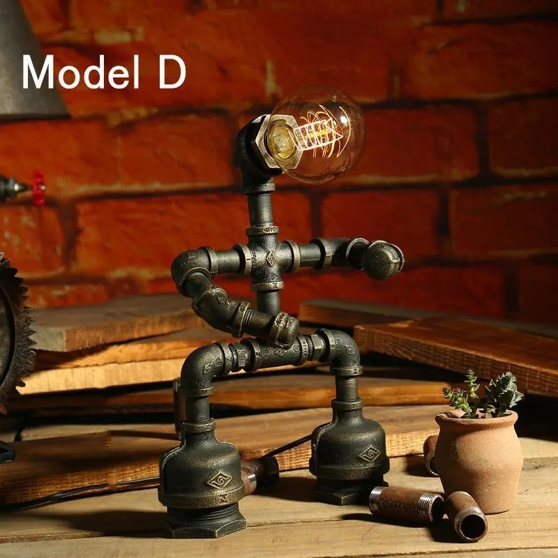 Iron pipe robot table lamp