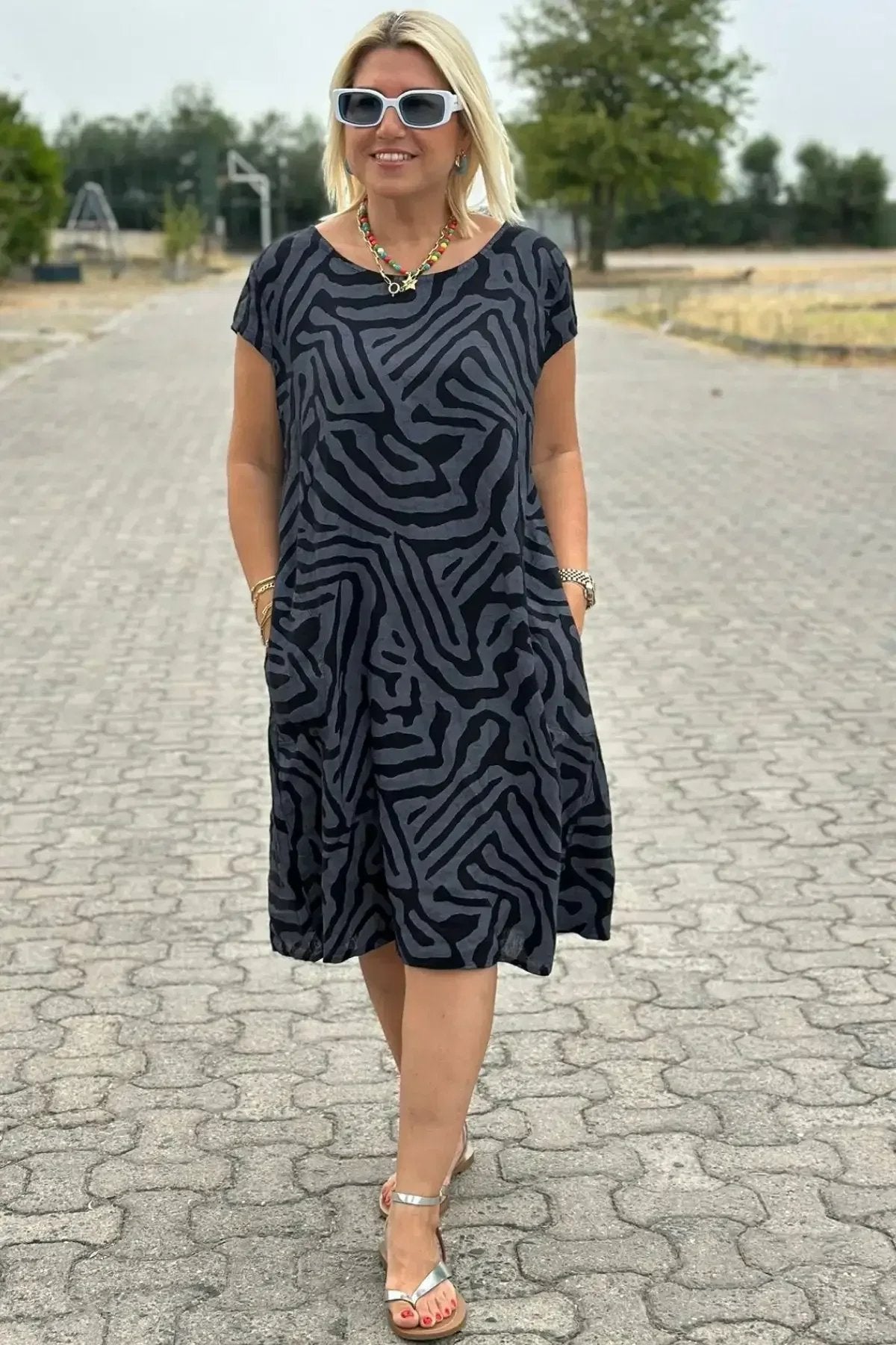Zebra Flow Dress: Unleash Wild Boho Elegance with Effortless Style