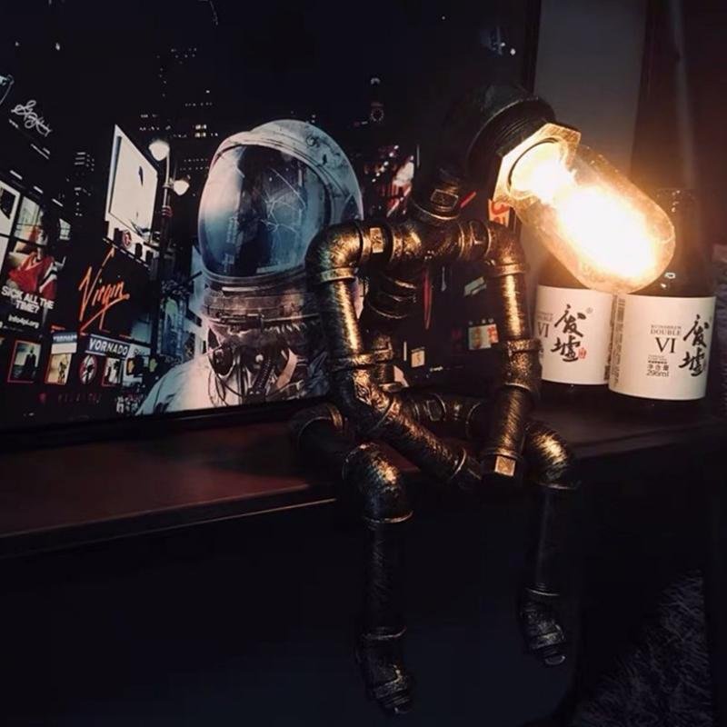 Iron pipe robot table lamp