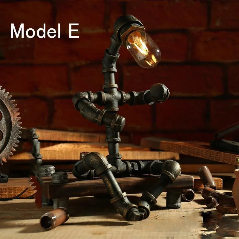 Iron pipe robot table lamp