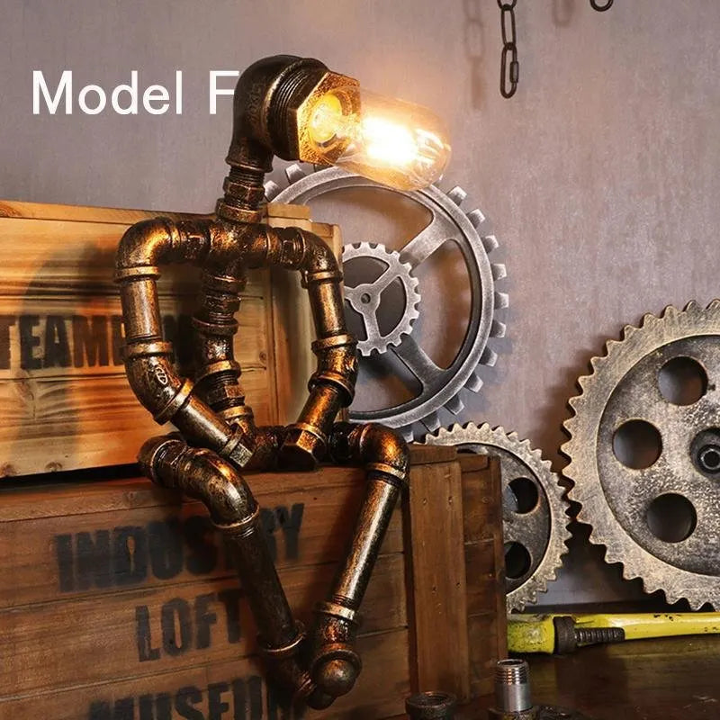 Iron pipe robot table lamp