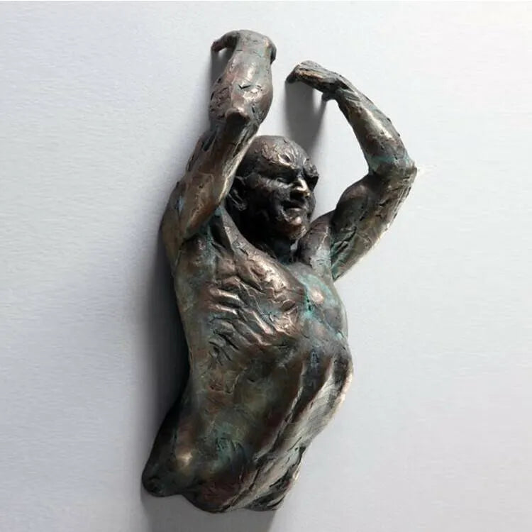 Antique sculpture on wall art bronze statue