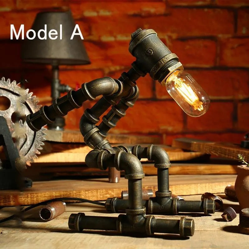 Iron pipe robot table lamp