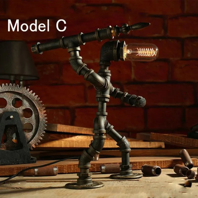 Iron pipe robot table lamp